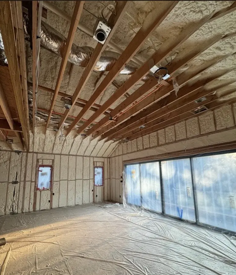 Interior walls and ceiling insulated with spray foam during new construction in Berea